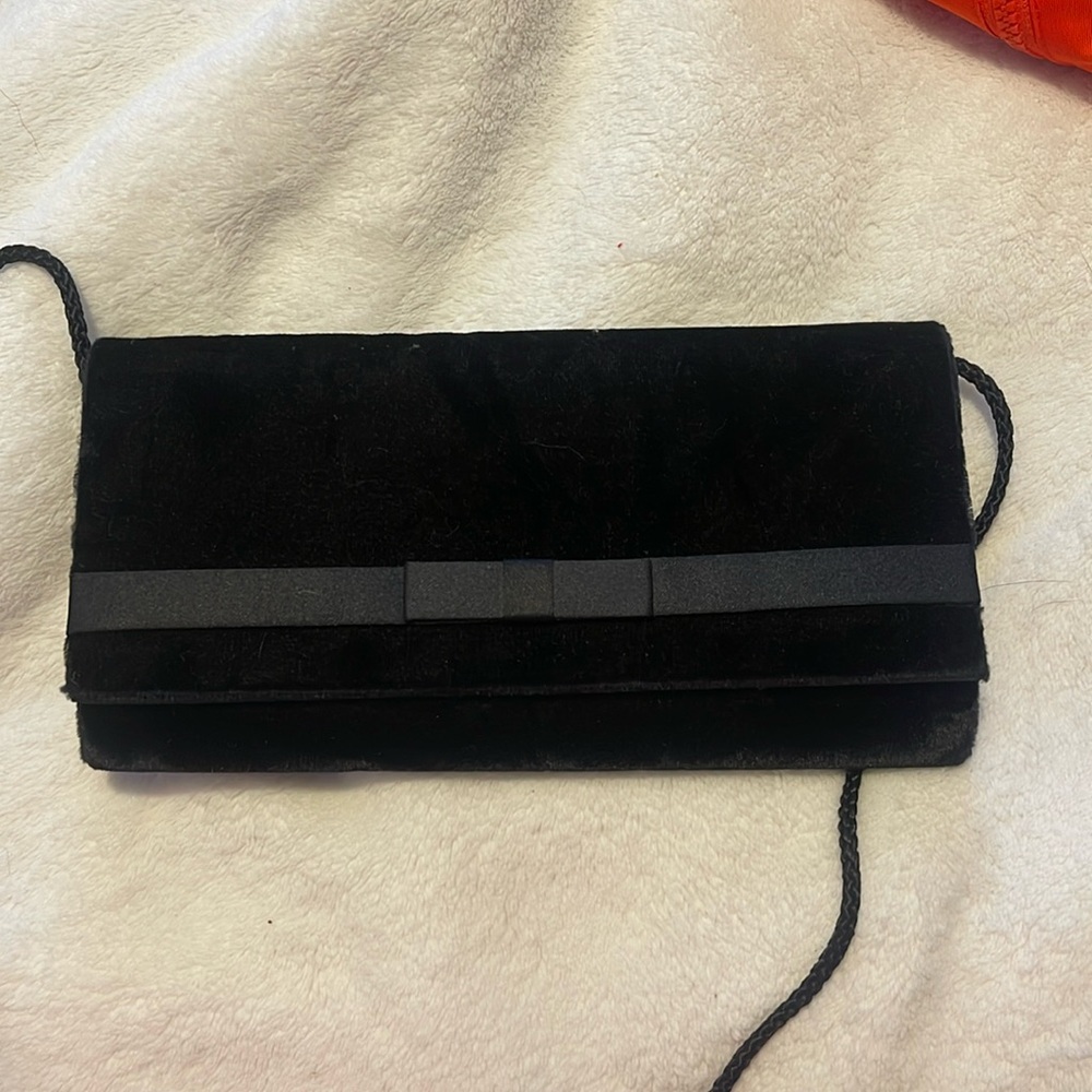 Cut black bow purse very elegant